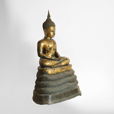 Lot 395 - A large Thai gilt-metal figure of the Buddha