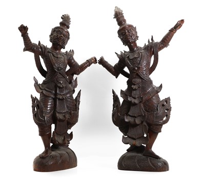Lot 180 - A pair of hardwood temple figures