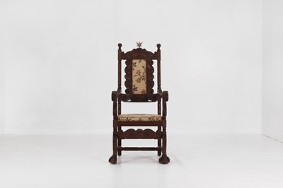 Lot 247 - A carved teak open armchair