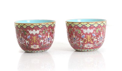 Lot 110 - A pair of Chinese famille rose cups