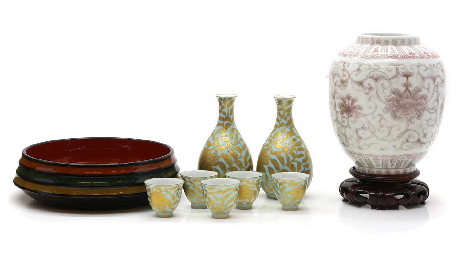 Lot 289 - A Chinese underglazed copper red vase and stand