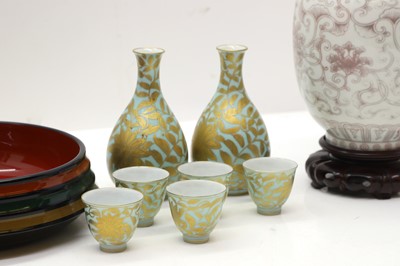 Lot 289 - A Chinese underglazed copper red vase and stand