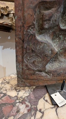 Lot 127 - A gilt-copper repoussé temple plaque