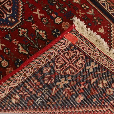 Lot 185 - A wool rug