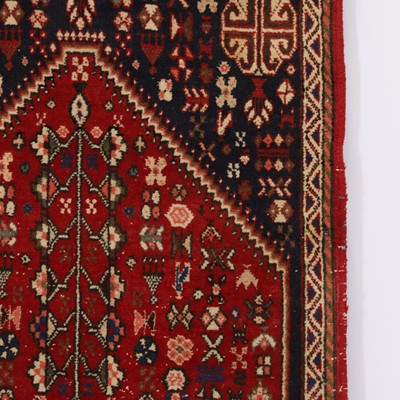 Lot 185 - A wool rug