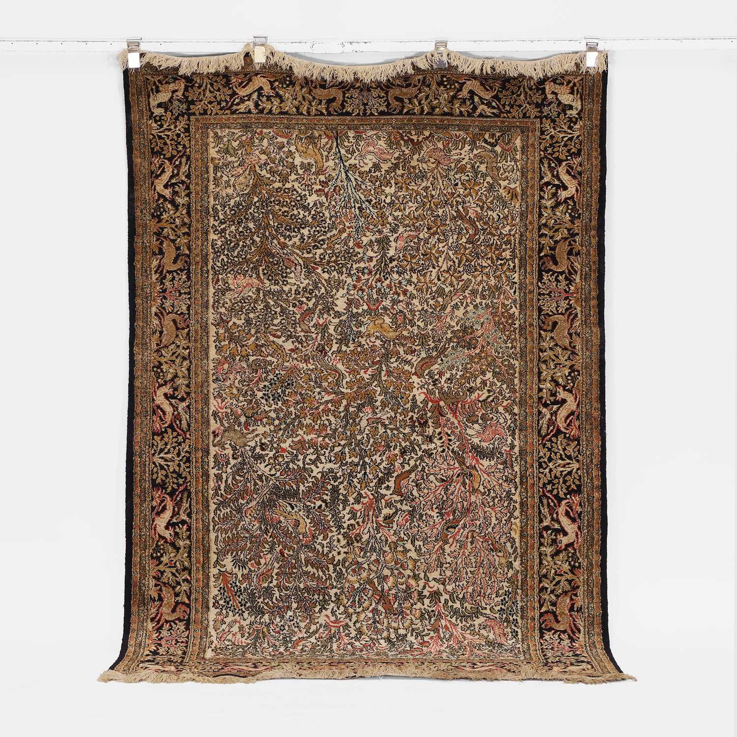 Lot 595 - A Qum carpet