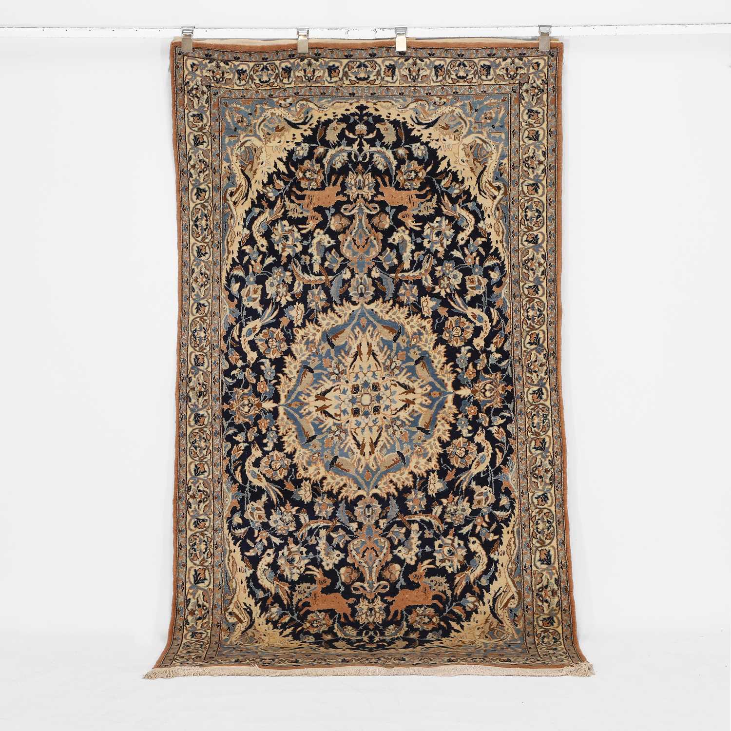 Lot 433 - A wool rug