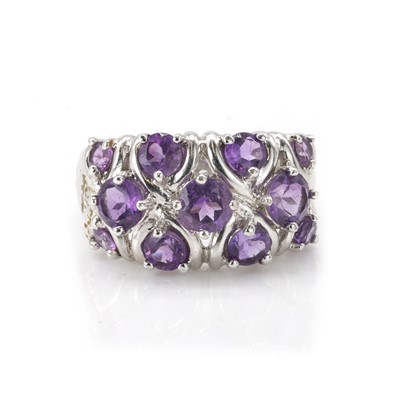 Lot 130 - A 9ct white gold amethyst dress ring