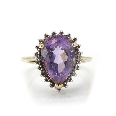 Lot 126 - A 9ct gold amethyst and diamond cluster ring