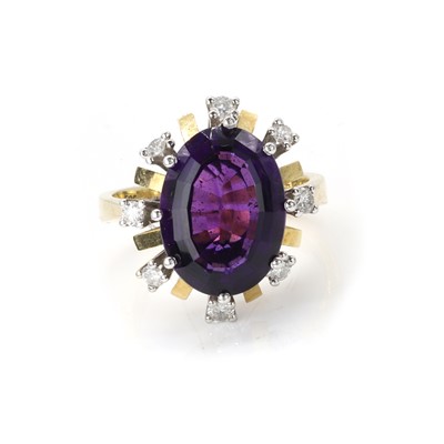 Lot 127 - An amethyst and diamond dress ring