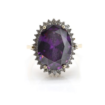 Lot 131 - An amethyst and diamond cluster ring