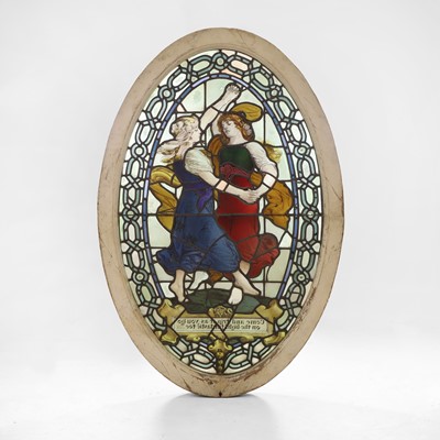 Lot 500 - A Pre-Raphaelite oval stained-glass window panel