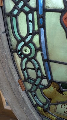 Lot 500 - A Pre-Raphaelite oval stained-glass window panel