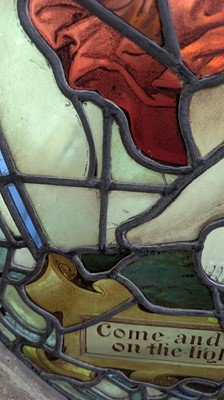 Lot 500 - A Pre-Raphaelite oval stained-glass window panel