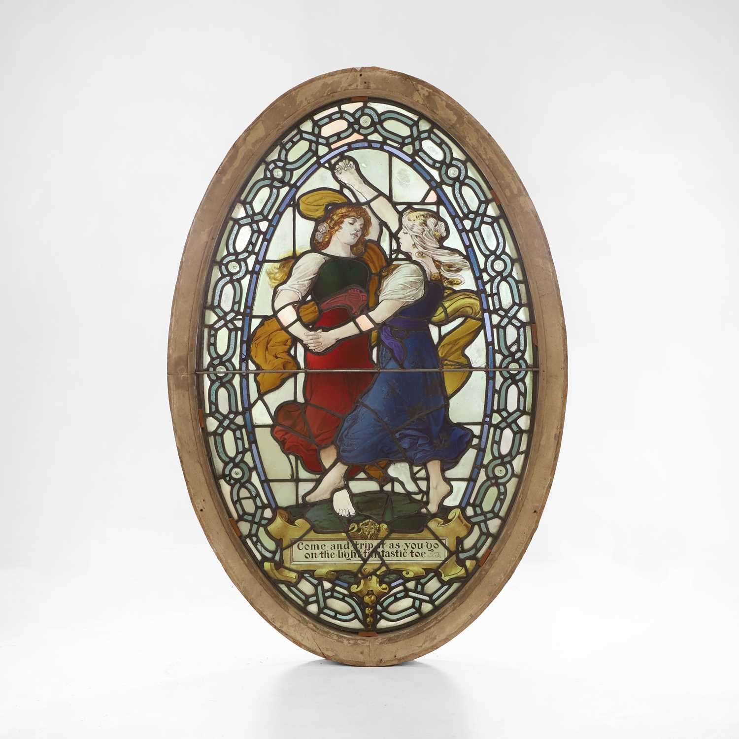 Lot 500 - A Pre-Raphaelite oval stained-glass window panel
