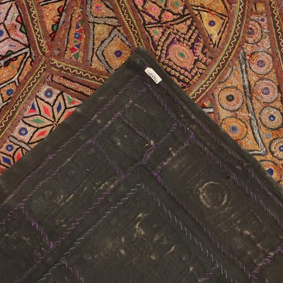 Lot 146 - A large patchwork and embroidered wall hanging