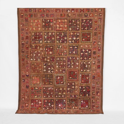 Lot 146 - A large patchwork and embroidered wall hanging