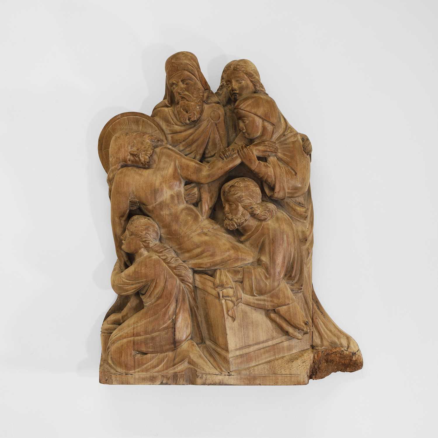 Lot 165 - A large carved walnut relief