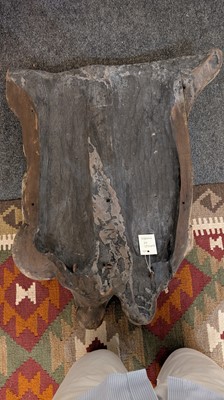 Lot 165 - A large carved walnut relief