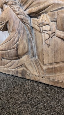 Lot 165 - A large carved walnut relief