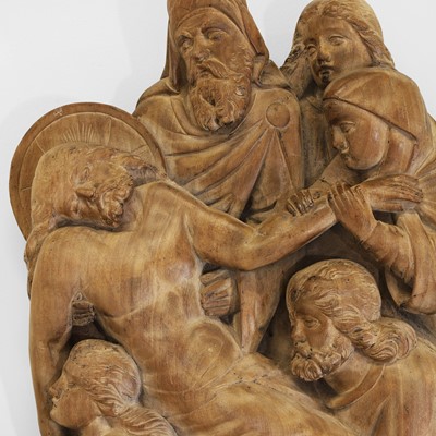 Lot 165 - A large carved walnut relief