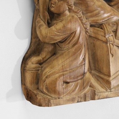 Lot 165 - A large carved walnut relief