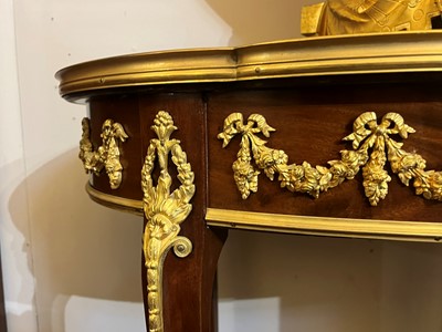 Lot 43 - A pair of Louis XVI-style kingwood and mahogany occasional tables