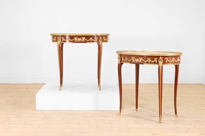 Lot 43 - A pair of Louis XVI-style kingwood and mahogany occasional tables
