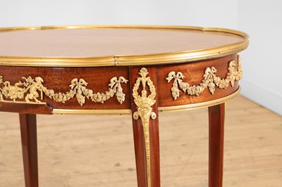 Lot 43 - A pair of Louis XVI-style kingwood and mahogany occasional tables