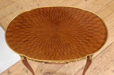 Lot 43 - A pair of Louis XVI-style kingwood and mahogany occasional tables