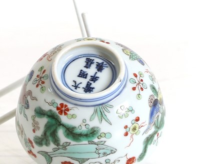 Lot 100 - A Chinese doucai tea bowl