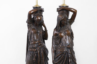Lot 80 - A pair of bronzed-metal table lamps