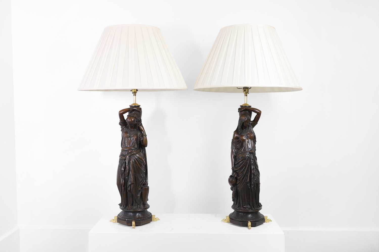 Lot 80 - A pair of bronzed-metal table lamps