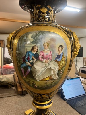 Lot 391 - A pair of large Sèvres-style porcelain vases and covers