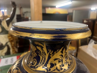 Lot 391 - A pair of large Sèvres-style porcelain vases and covers