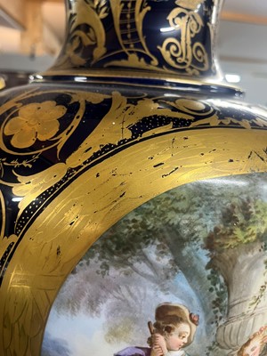 Lot 391 - A pair of large Sèvres-style porcelain vases and covers