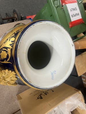 Lot 391 - A pair of large Sèvres-style porcelain vases and covers