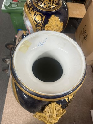 Lot 391 - A pair of large Sèvres-style porcelain vases and covers