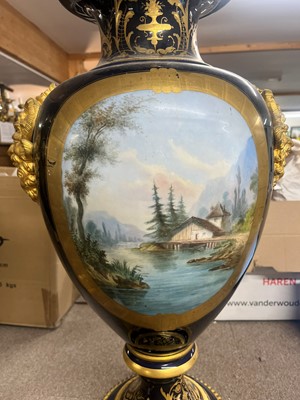 Lot 391 - A pair of large Sèvres-style porcelain vases and covers