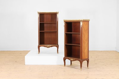 Lot 15 - A pair of small Louis XVI Transitional-style mahogany, tulipwood and gilt-bronze bookcases