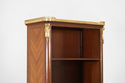 Lot 15 - A pair of small Louis XVI Transitional-style mahogany, tulipwood and gilt-bronze bookcases