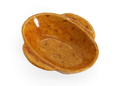 Lot 108 - A Chinese stoneware ear cup
