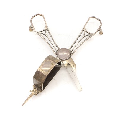Lot 49 - A pair of George III silver candle snuffers