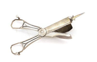 Lot 49 - A pair of George III silver candle snuffers