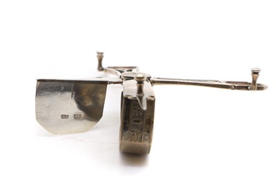 Lot 49 - A pair of George III silver candle snuffers
