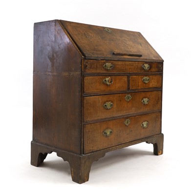 Lot 549 - A Queen Anne walnut bureau