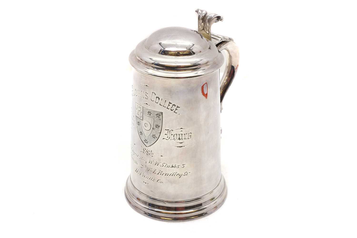 Lot 106 - A silver-plated 'St Johns College 1884 Torpid Fours' lidded tankard