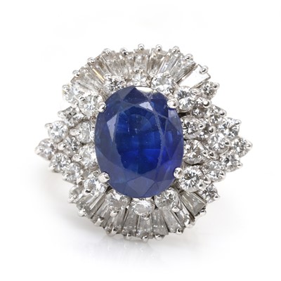 Lot 243 - An 18ct white gold sapphire and diamond cluster ring, c.1960s