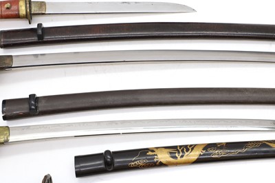 Lot 258 - A group of four Japanese swords