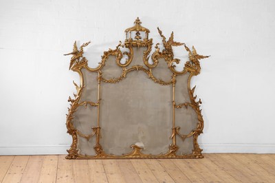 Lot 262 - A George III-style carved giltwood overmantel mirror